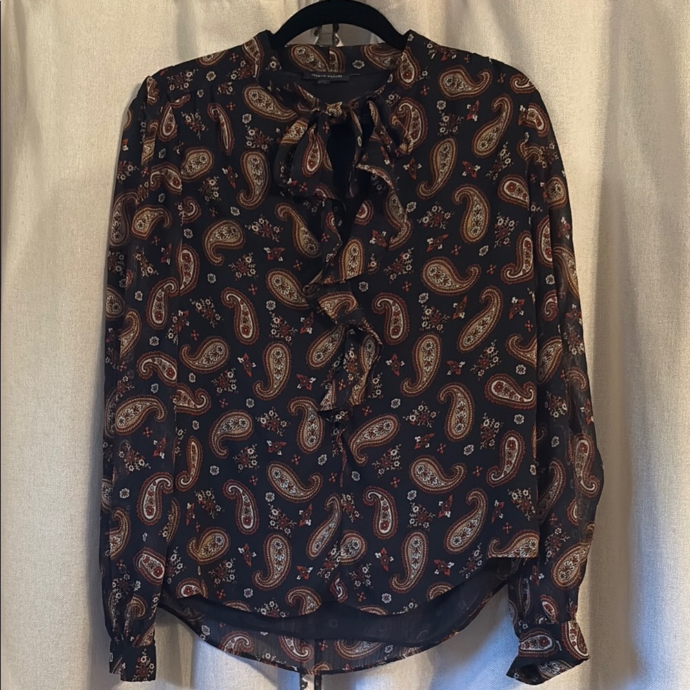 Black long sleeve blouse with mandarin collar and tie front ruffled features